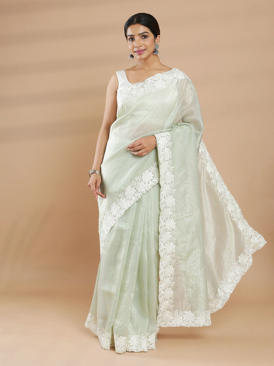 Light Pista Green Color Organza Saree With Cream Floral Embroidery