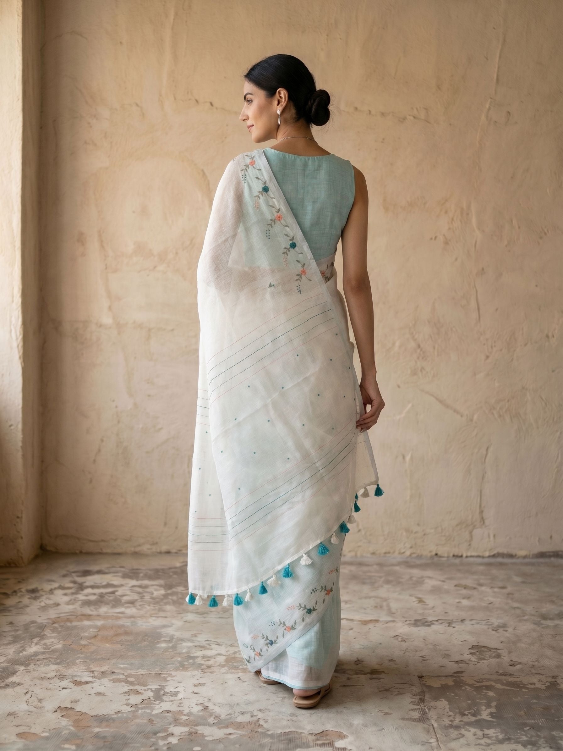 Semi Linen Mint Green Polka Dot Jacquard Saree with Sequin Embellished White Pallu Border