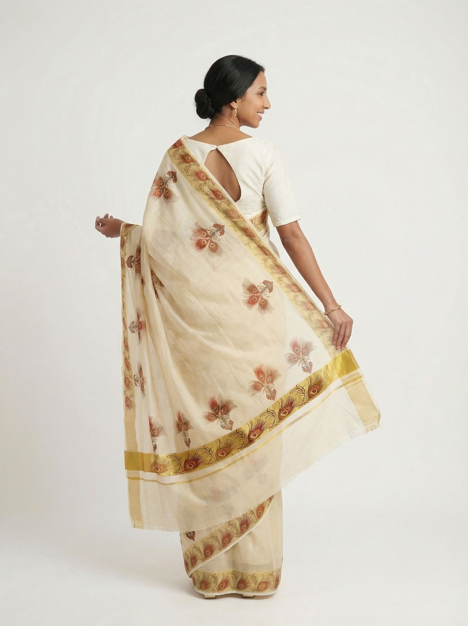 Cotton Cream Saree with Peacock Feather Print Border and Traditional Pallu