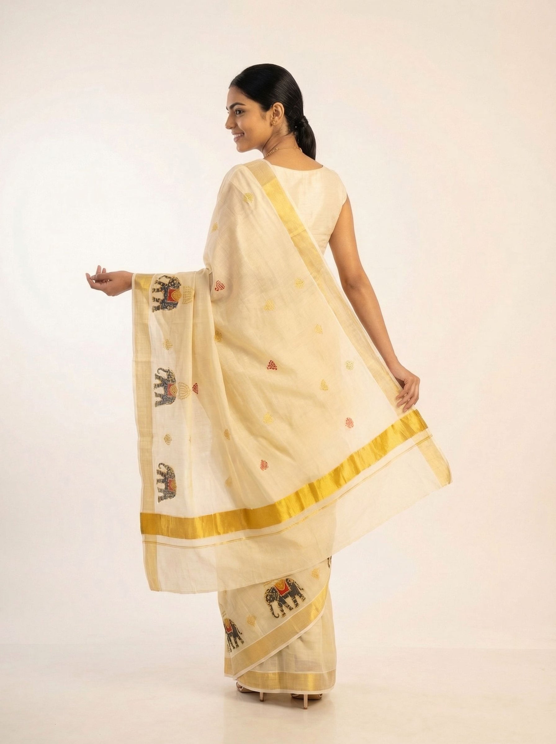 Tissue Saree with Elephant Motif Print and Golden Border Set Saree