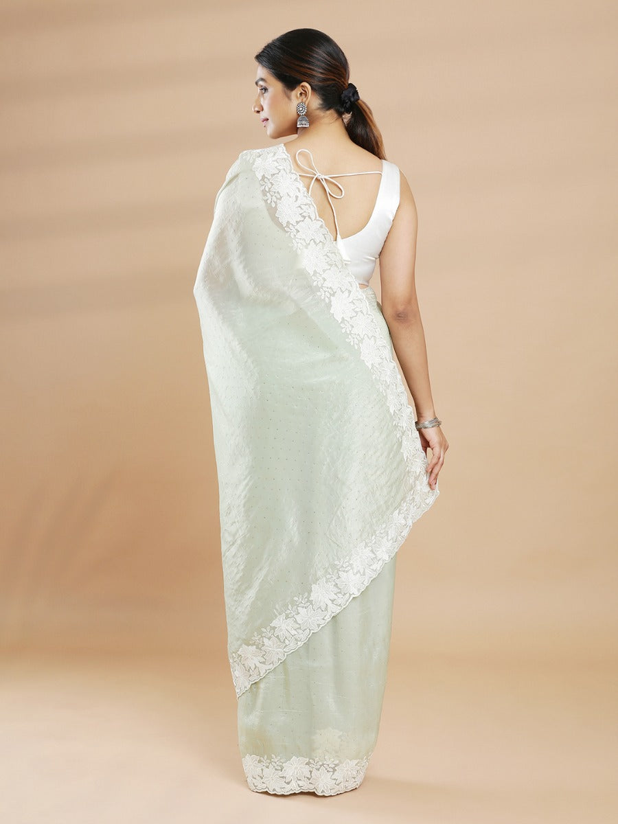 Light Pista Green Color Organza Saree With Cream Floral Embroidery