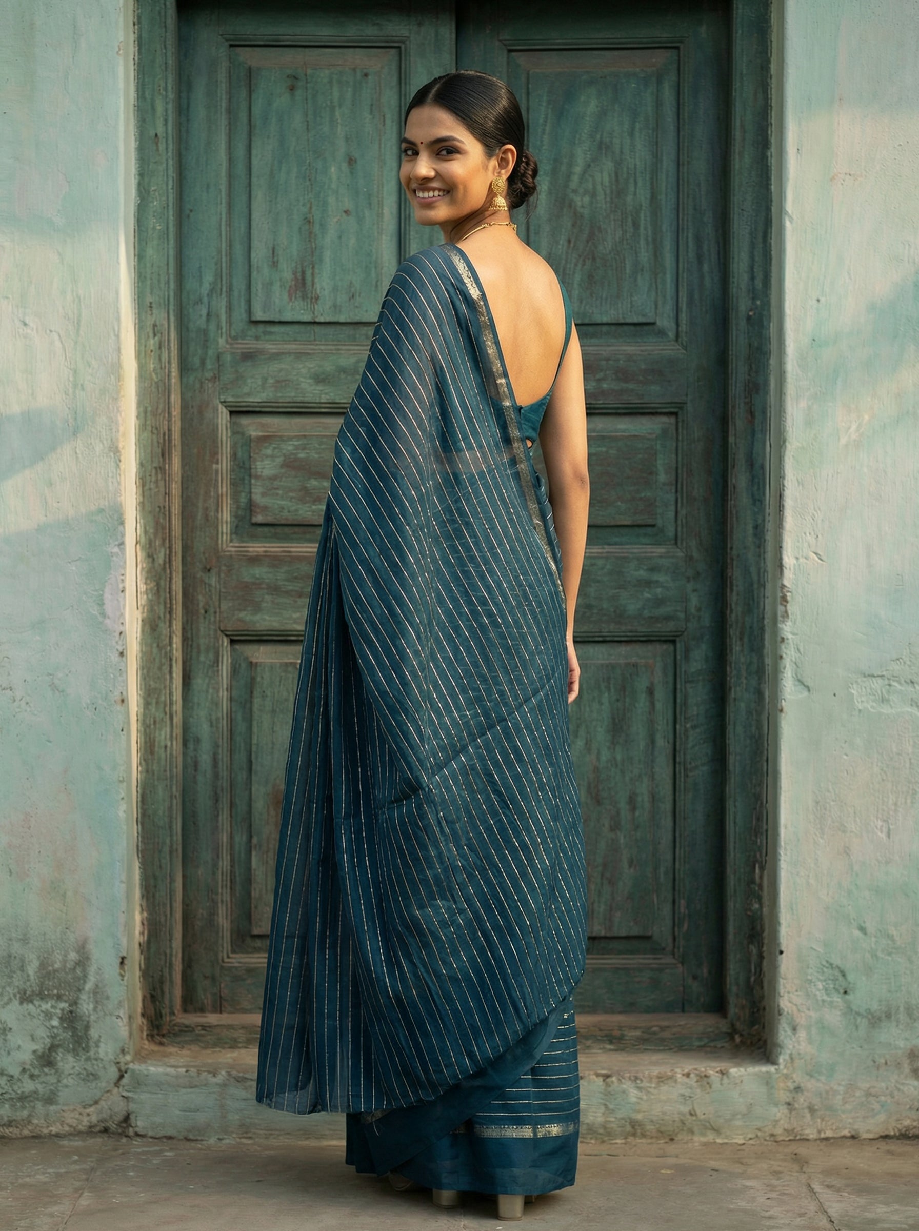 Synthetic Teal Green Saree with Classic Gold Stripes