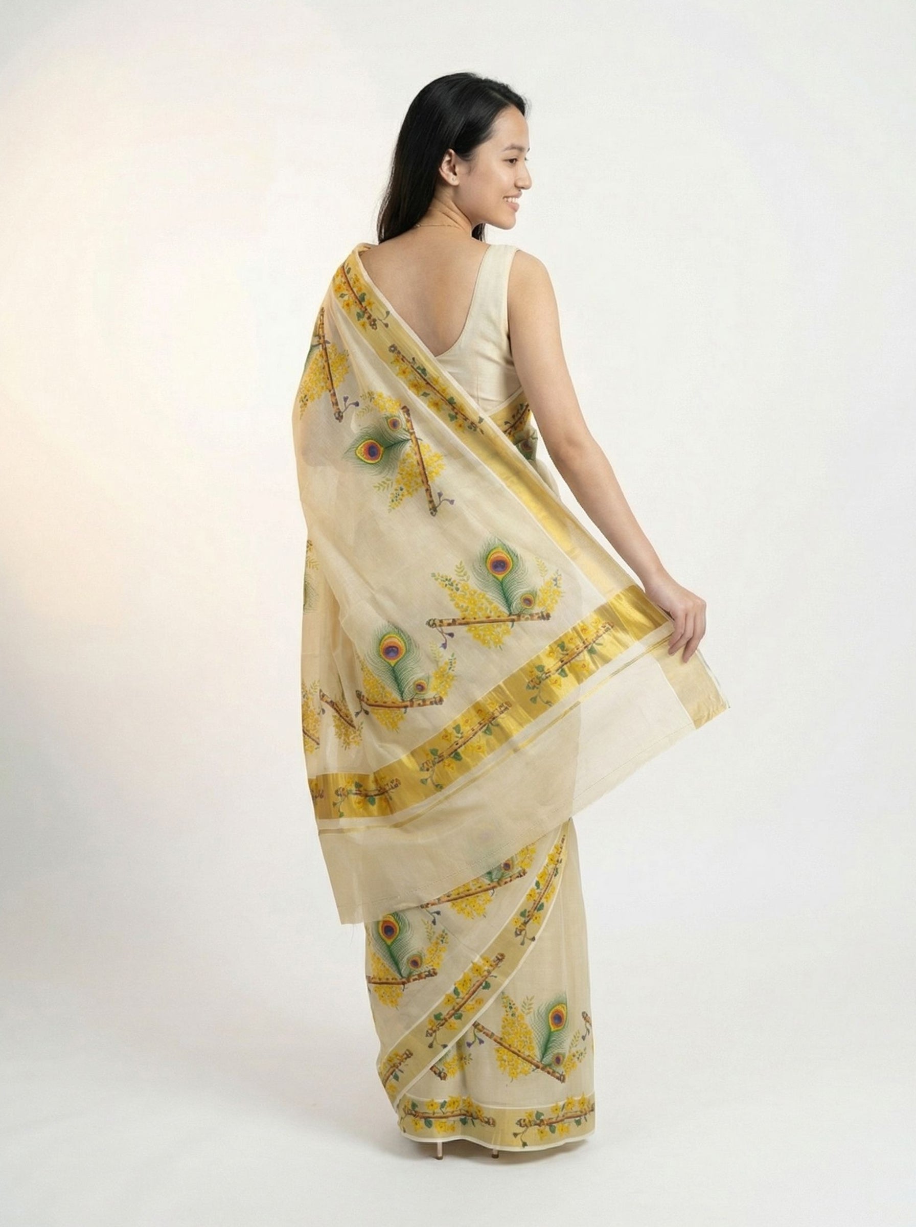 Cotton Cream Saree with Peacock Feather Print and Golden Border