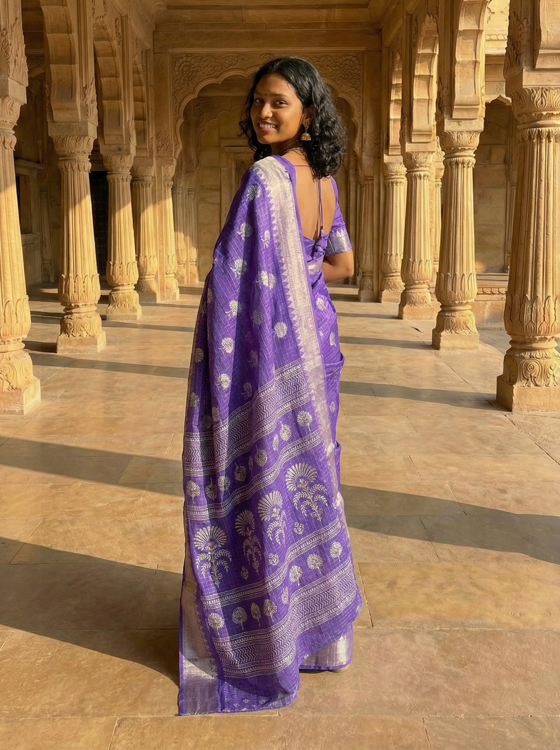 Synthetic Purple Saree with Gold Woven Motifs and Zari Border