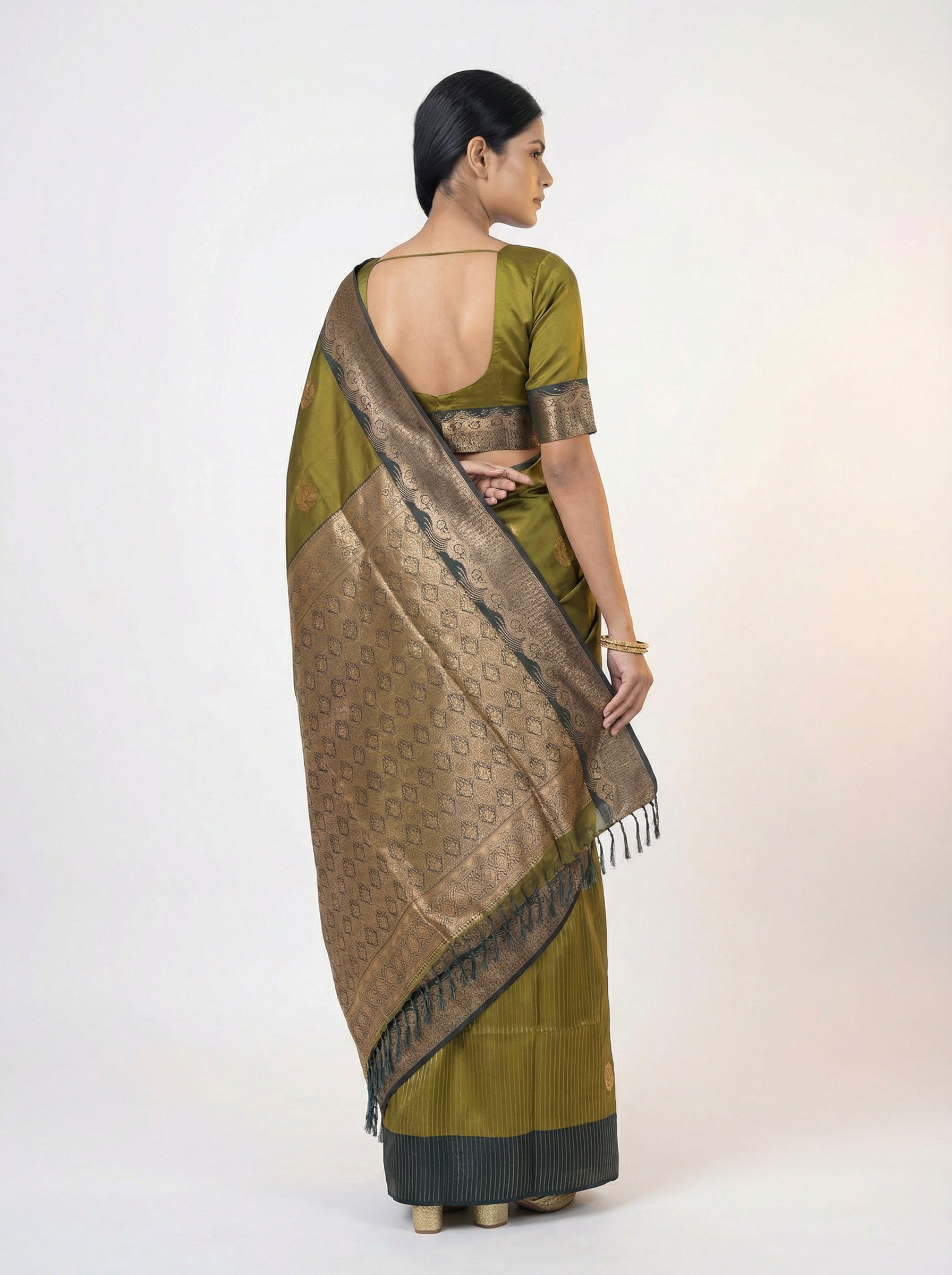 Semi Soft Silk Elegant Olive Green  Saree with Spread Butta Design