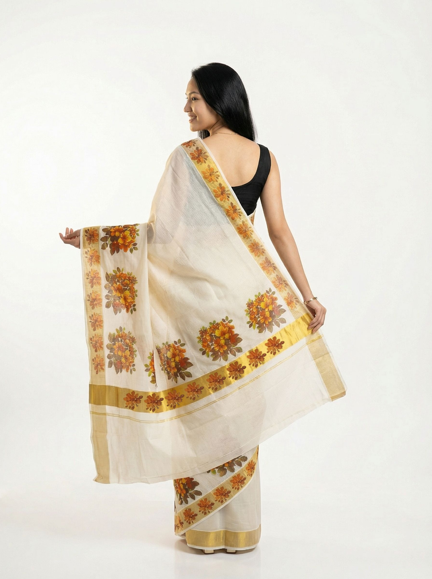 Cotton Cream Saree with Orange Floral Printed Border and Golden Accent Pallu