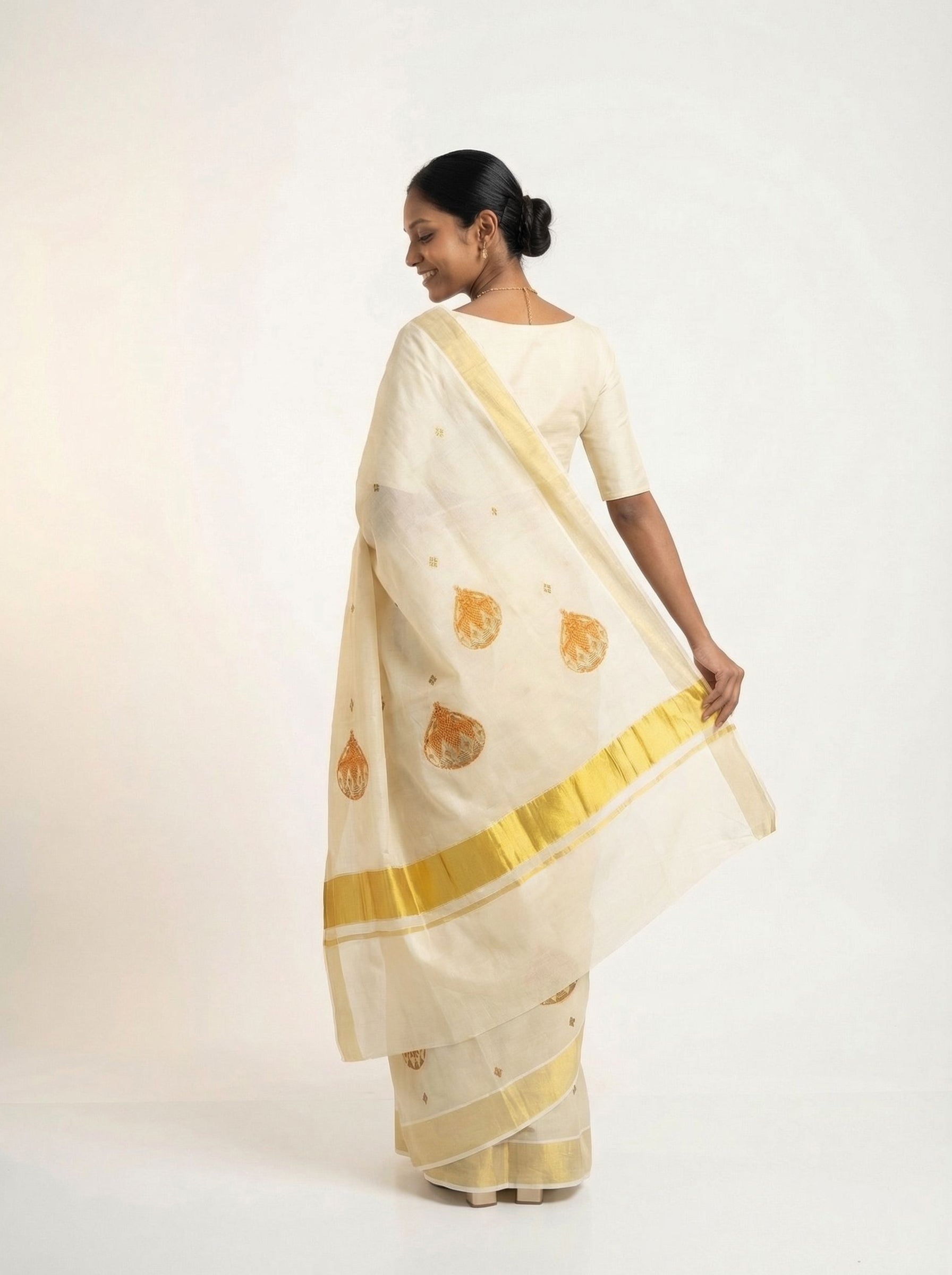 Cotton Cream Saree with Traditional Pot Motif and Golden Border Set Saree