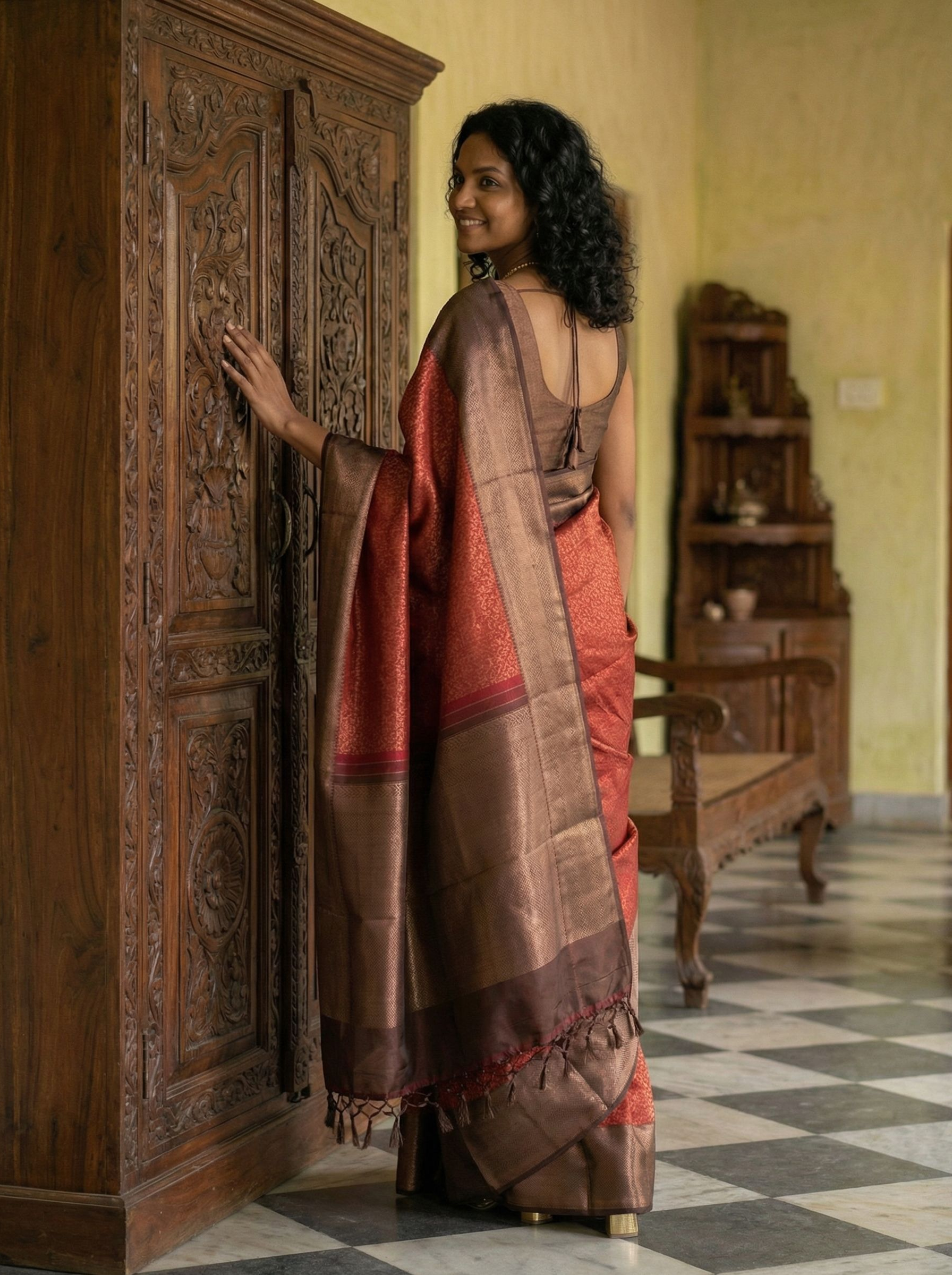 Kanjivarm Pure Silk Terracotta Red Self-Design Saree with Bronze
