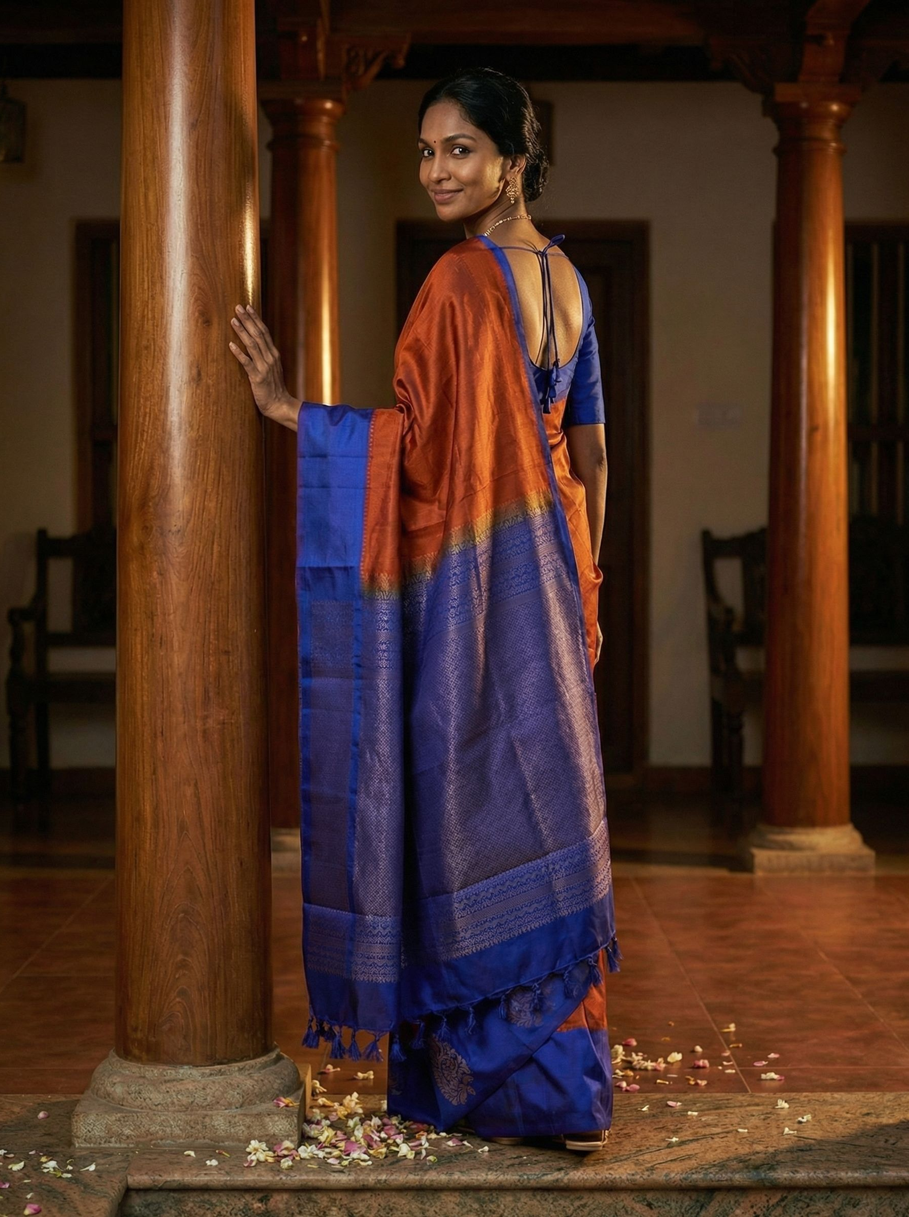 Kanjivaram silk Rust Orange and Royal Blue Saree with Paisley Zari Border