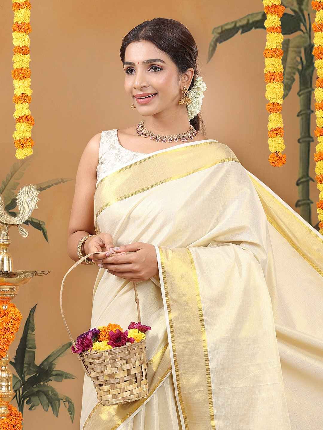 Kalyan Silks Golden Tissue Saree with Peacock Design on Pallu & Golden Zari Border