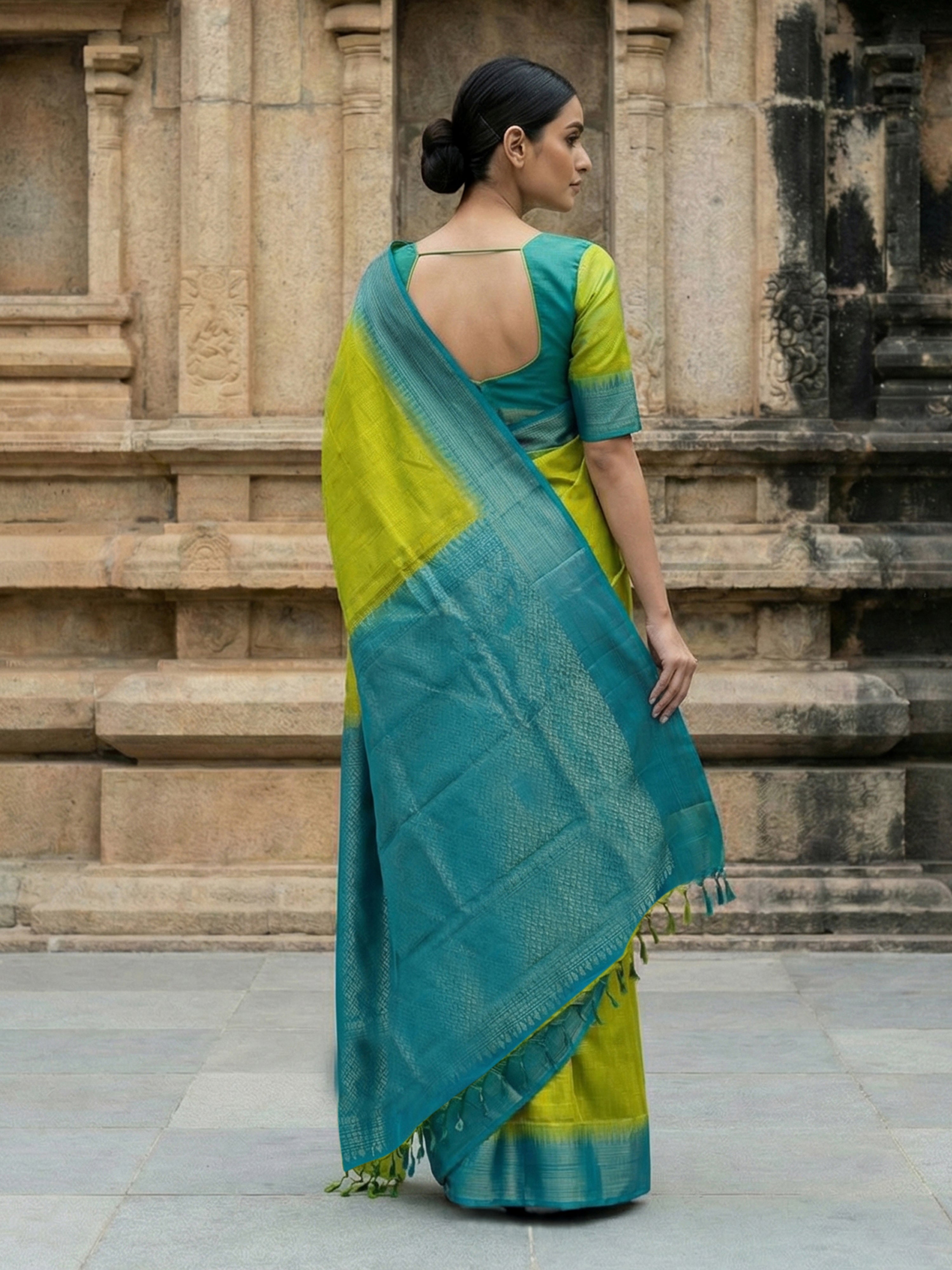 Kanjivaram Silk Elegant Light Green Saree with Teal Blue Border