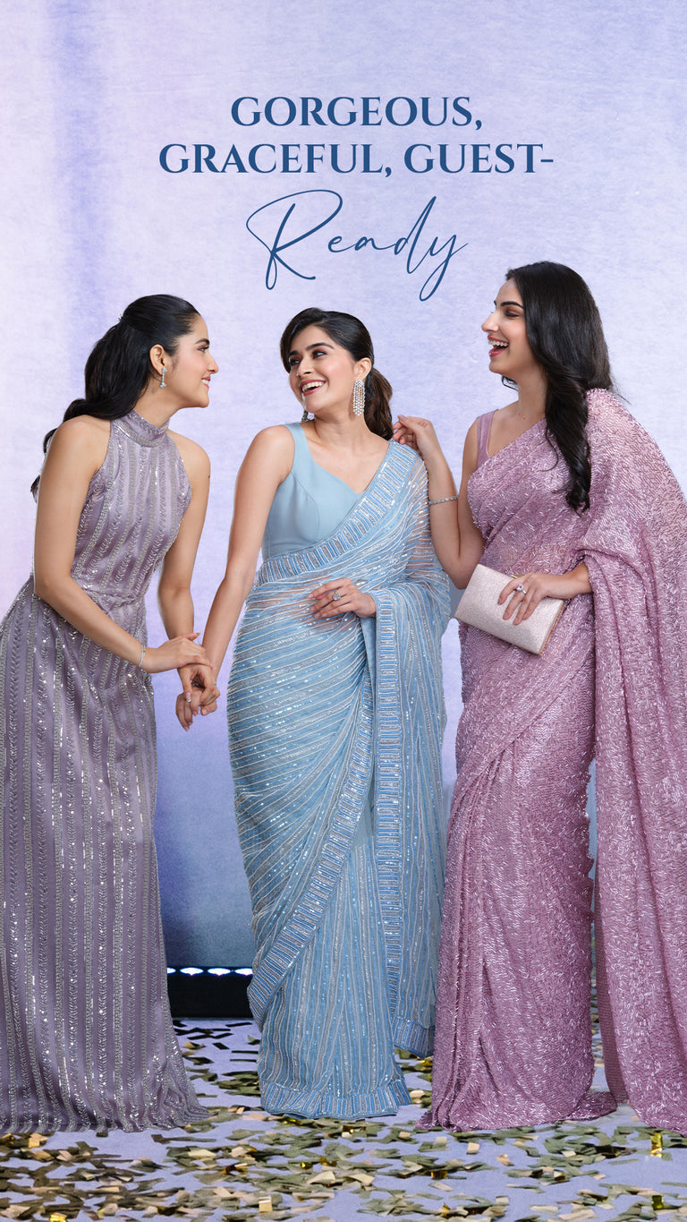 Three women in elegant sarees with a text overlay on a light blue background - Kalyan Silks