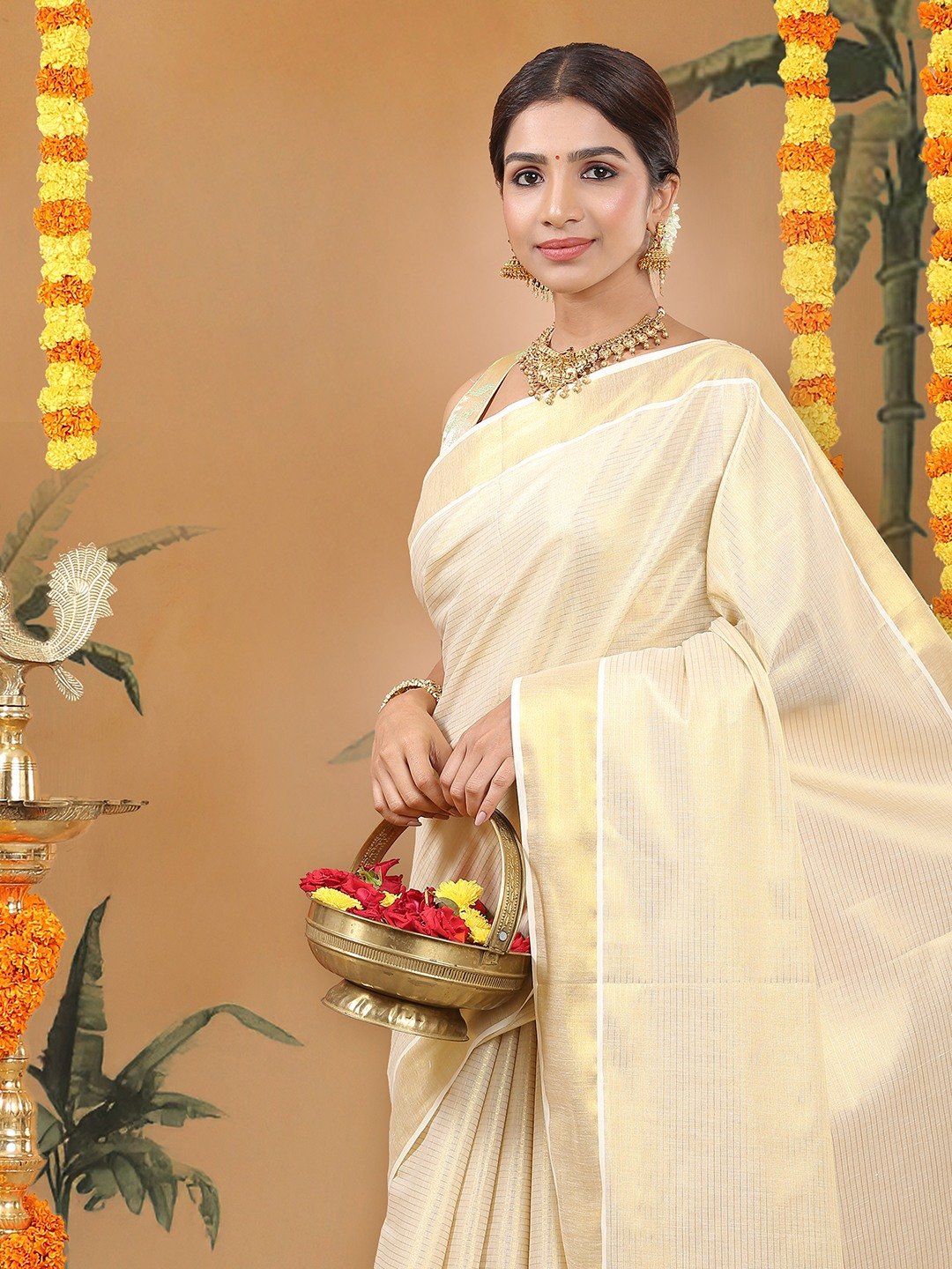 Kalyan Silks Golden Tissue Saree with Horizontal Stripes & Bright Kasavu Border