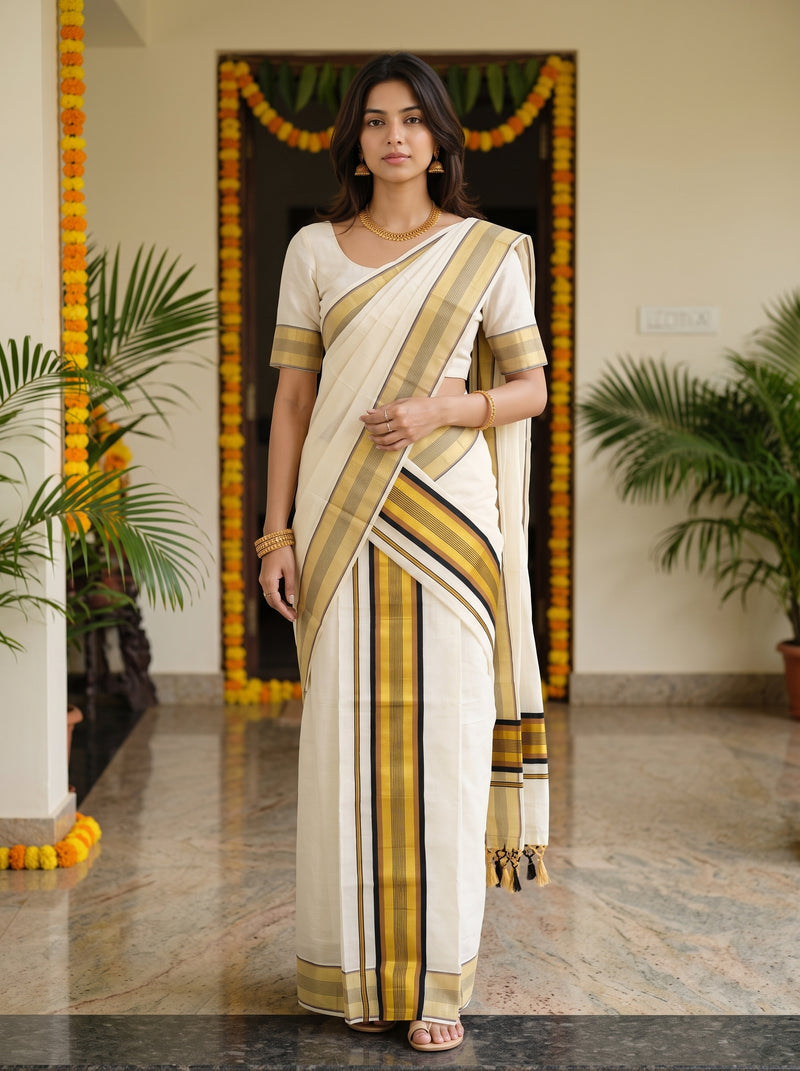 A woman modeling a traditional Indian saree in an indoor setting with marble flooring and potted plants. The saree is off-white/cream with prominent vertical stripes in black, mustard yellow, and brown, paired with a matching cream blouse.