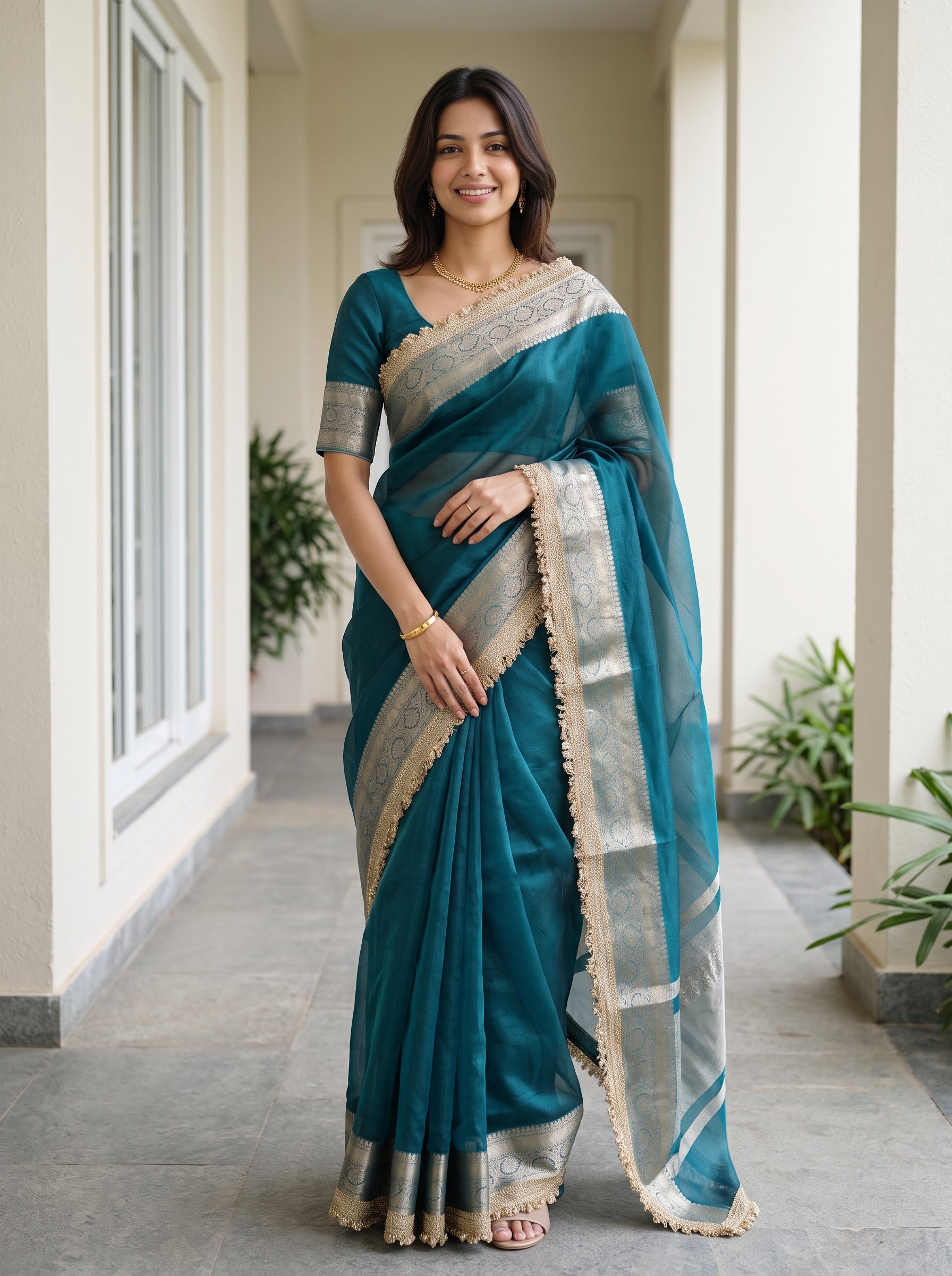 Tissue Banarasi Teal Plain Saree with Gold Zari Border