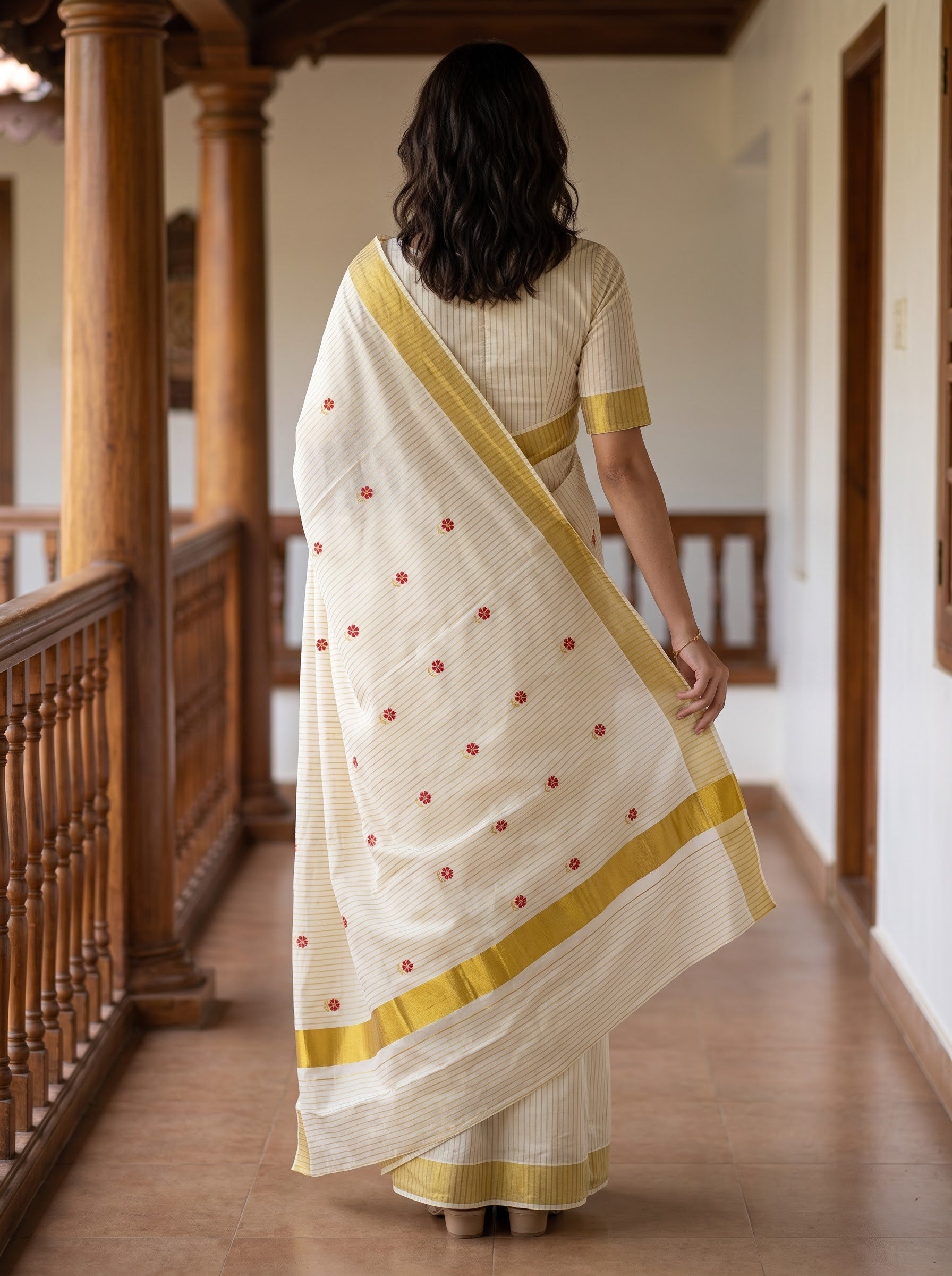 Cotton Cream Pinstripe with Golden Zari Border and Red Floral Motifs Onam Festive Kerala Saree