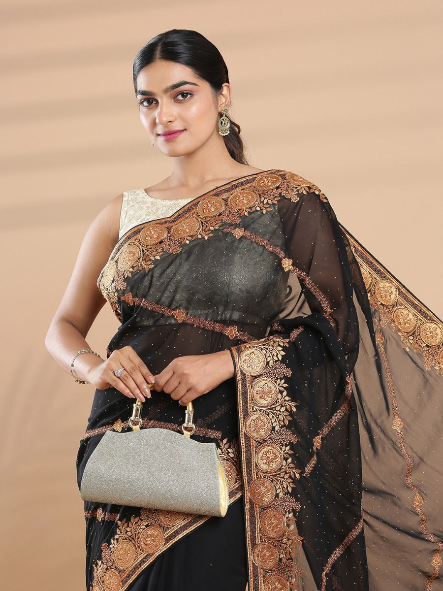 Black Color Georgette Saree With Golden Stripe Embroidery Design On Body