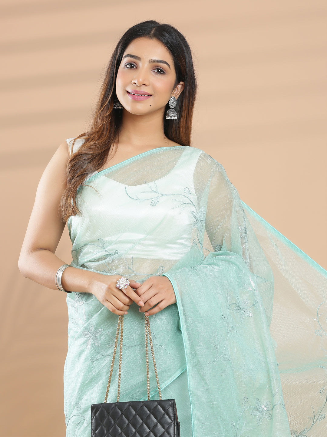 Light Teal Net Saree With Sequence And Floral Machine Embroidery Design