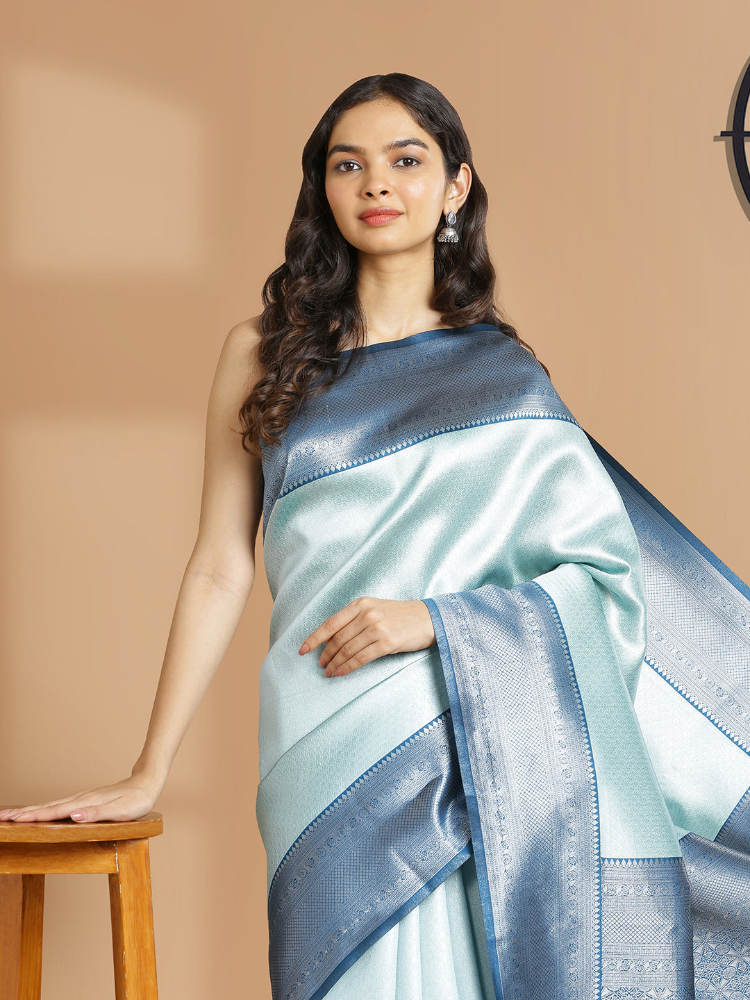Pale Blue Color Silver Woven Designed Art Silk Saree With Peacock Blue Border