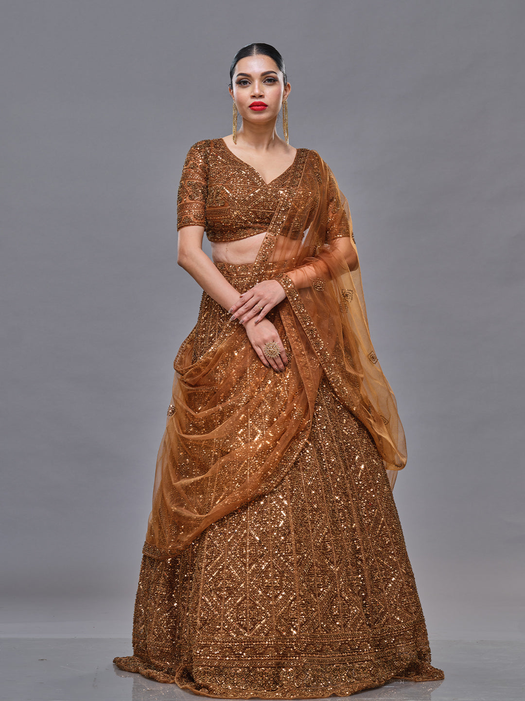 Geometrical Design Gold And Antique Tube Design Lehenga