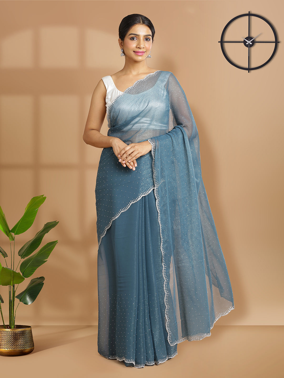Peacock Blue Georgette Tissue Saree With Silver Mini Stones Over Body