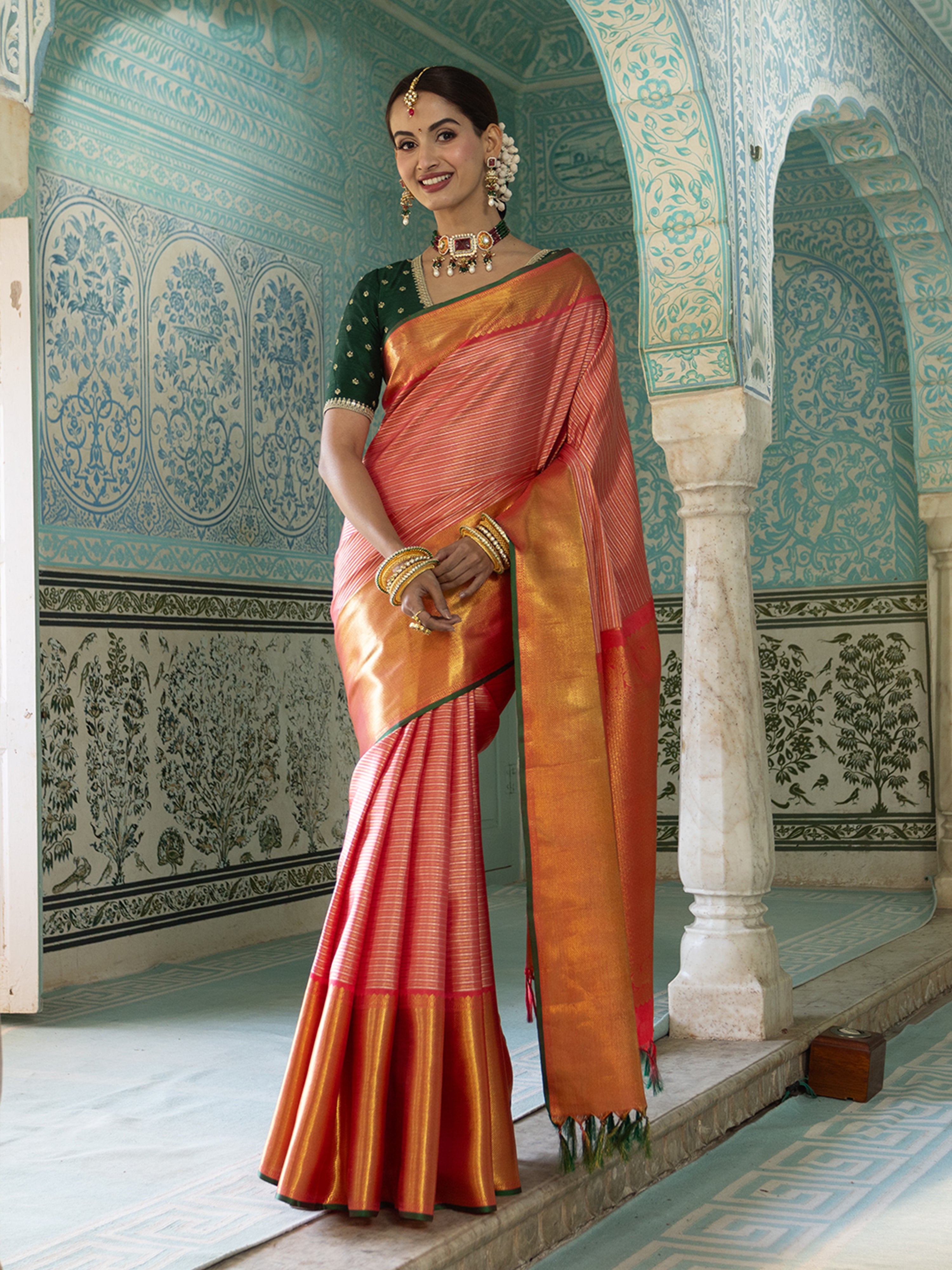Ruby Pink Color with A Golden Kanchipuram Saree