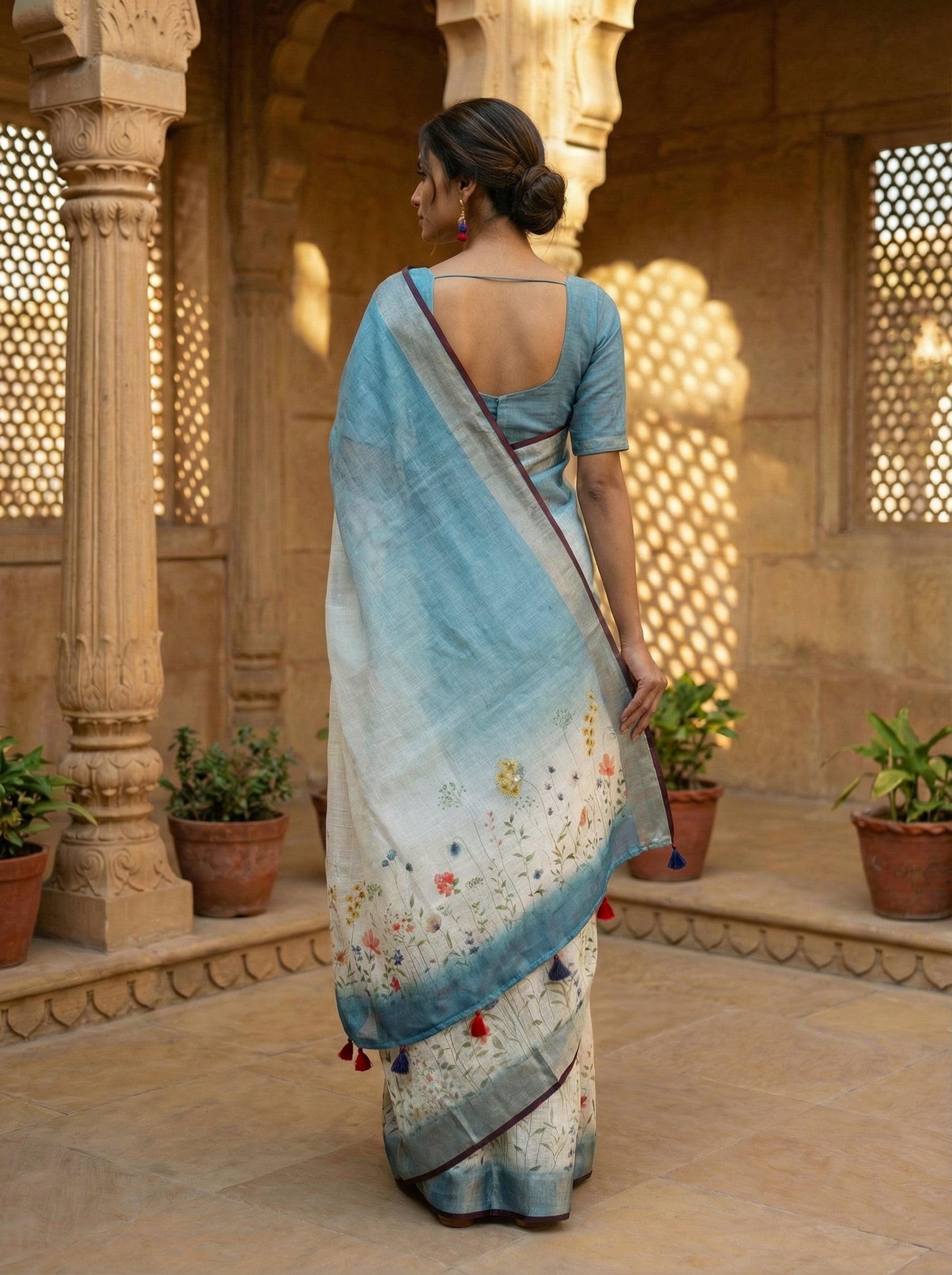 Sky Blue Linen Saree with Multicolor Floral Embroidered Pallu & Contrast Border