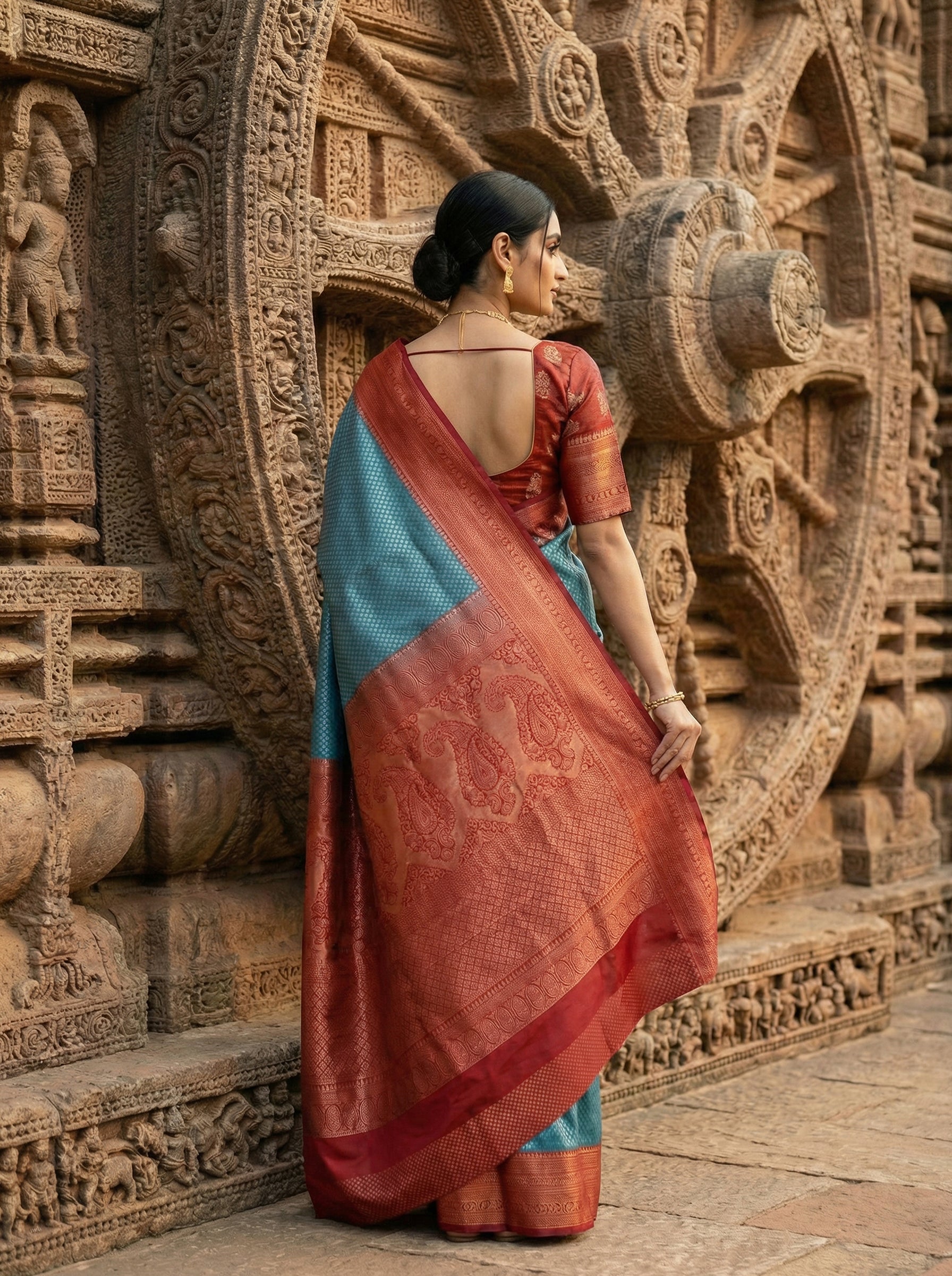 Pure Kancheepuram Brocade Silk Saree in Peacock Blue with Golden Zari – Floral Body