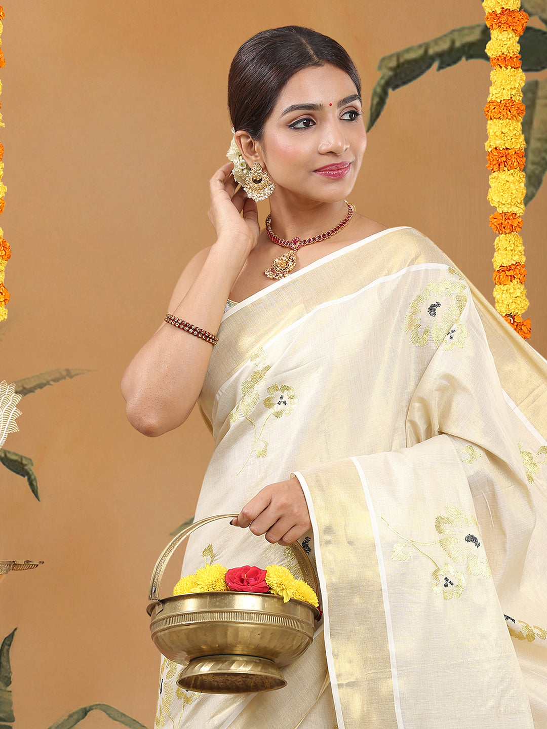Tissue Golden Kerala Set Saree with Black-Golden Solid Floral Embroidery and Broad Kasavu Borders