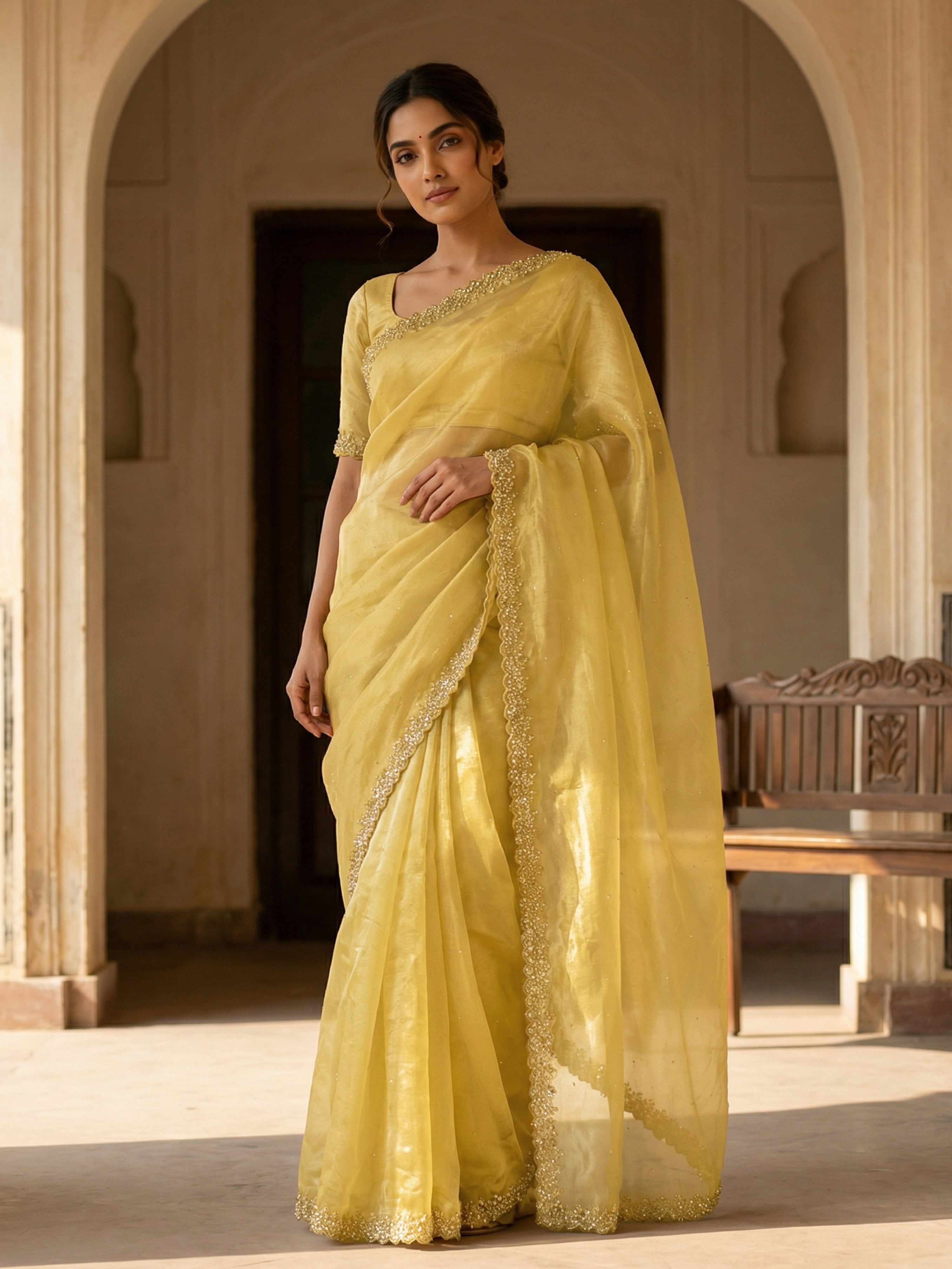 Yellow Designer Organza Saree with Spread Stone Work & Scalloped Stone-Shell Border