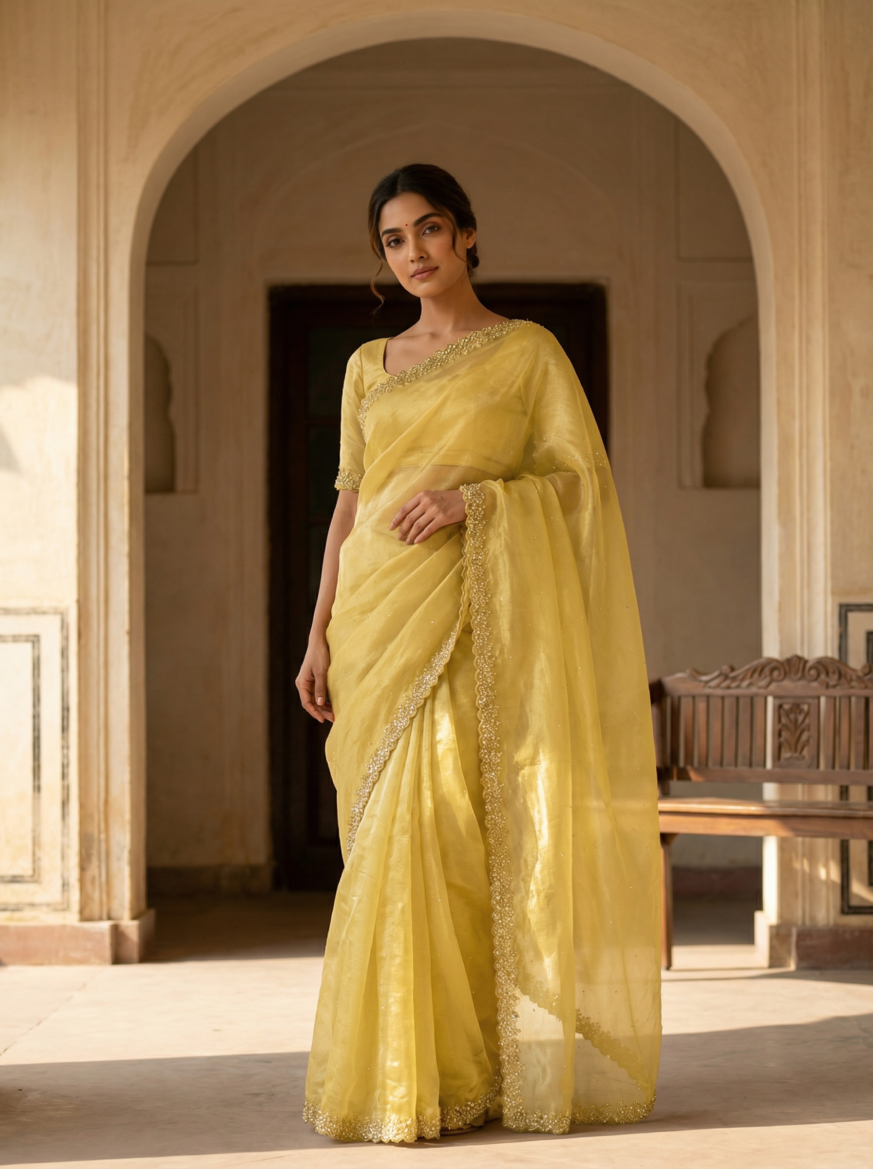 Yellow Designer Organza Saree with Spread Stone Work & Scalloped Stone-Shell Border