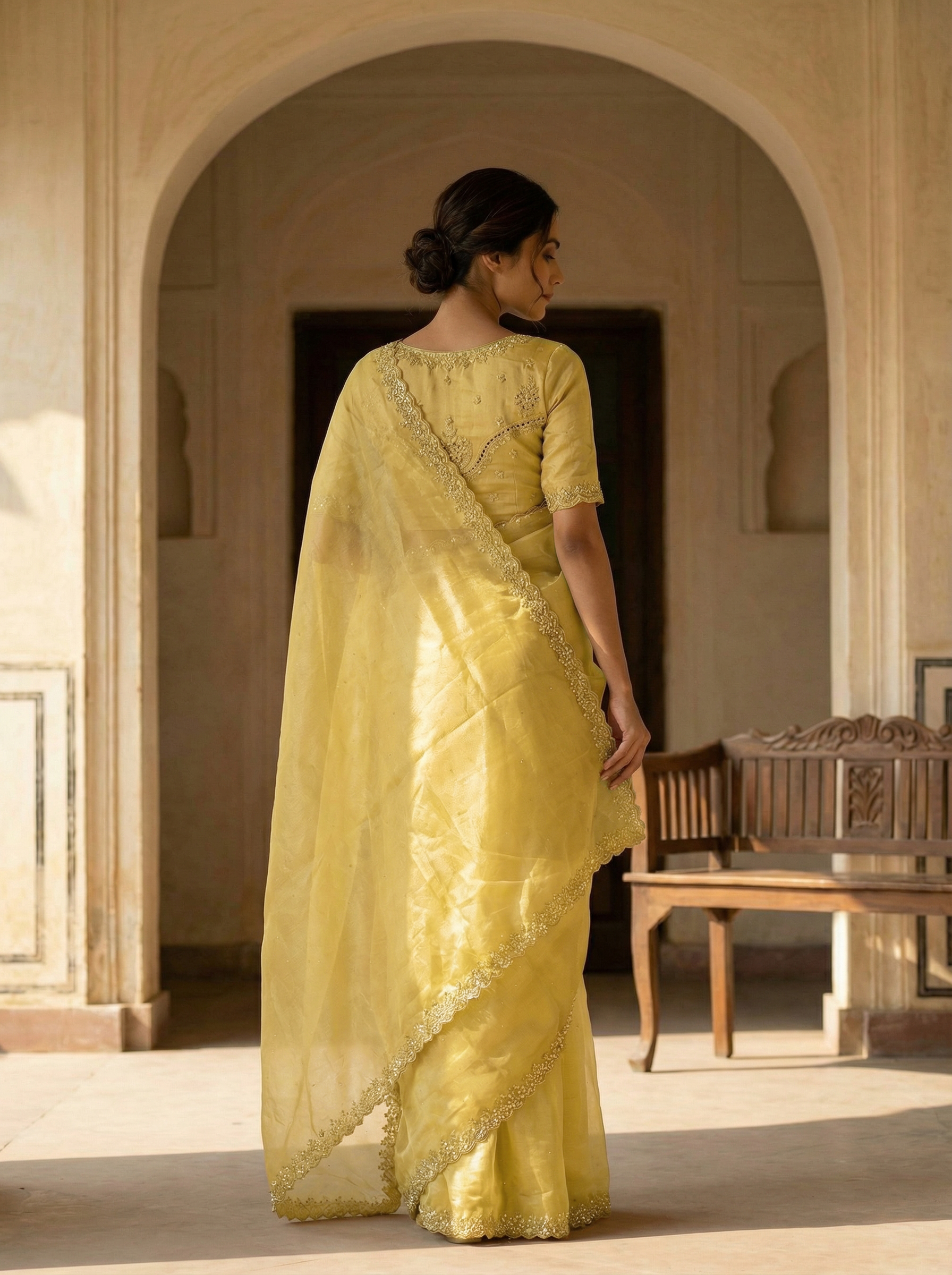 Yellow Designer Organza Saree with Spread Stone Work & Scalloped Stone-Shell Border