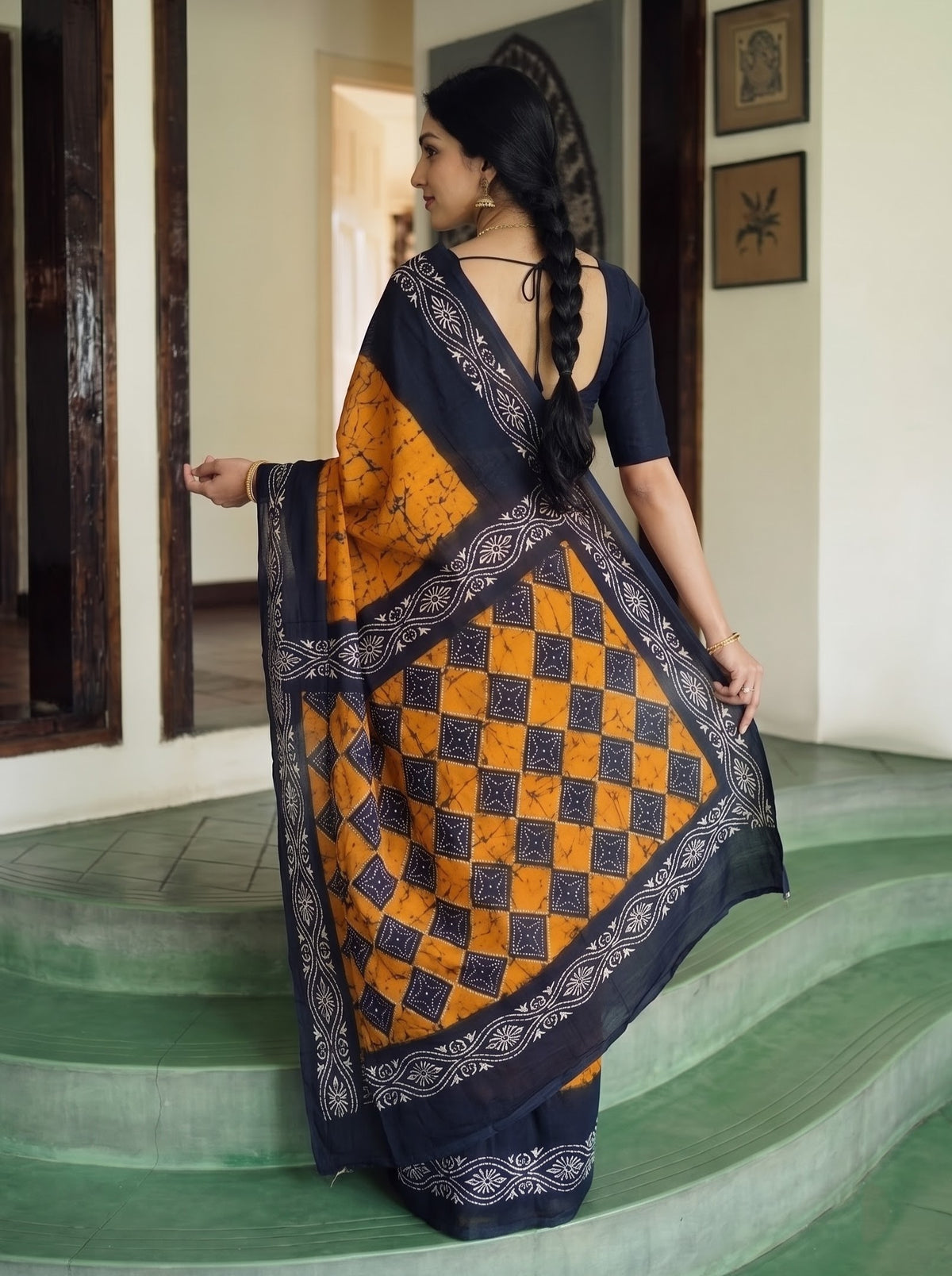 Cotton Orange Batik Print Saree with Navy Blue Diamond Checkered Pallu and Floral Border