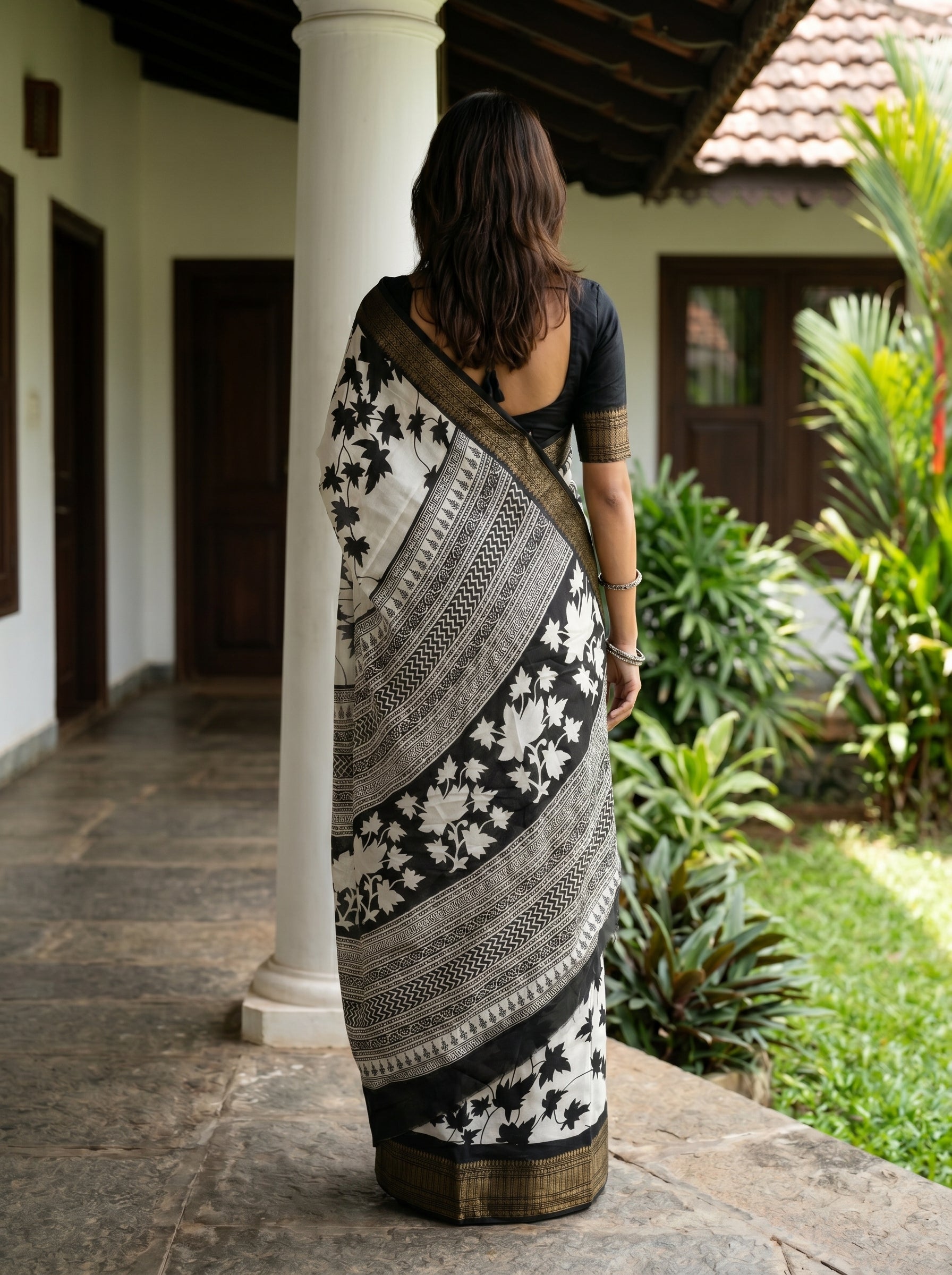 Synthetic White Black Leaf Print Saree with Contrast Woven Border