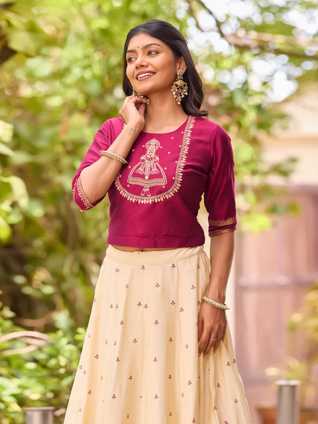 Magenta Silky Slub Crop Top with Kathakali Embroidery & Off-White Skirt Set