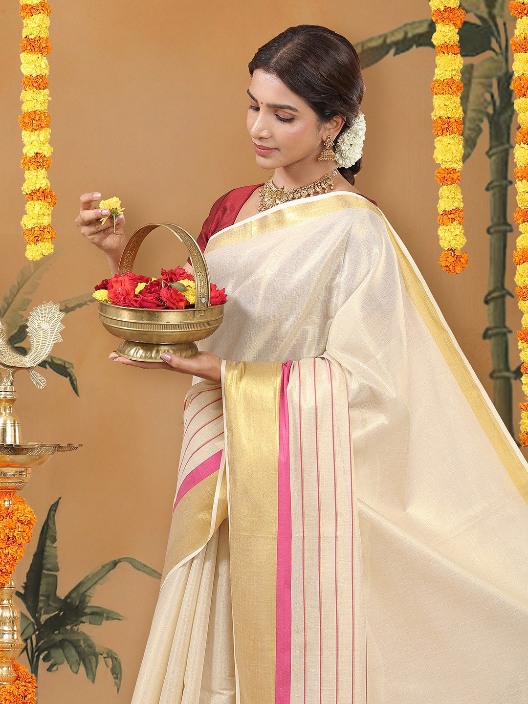 Kalyan Silks Golden Tissue Set Saree with Golden With Pink Dual Kasavu Layered Border  And Pink & Cream Tassels